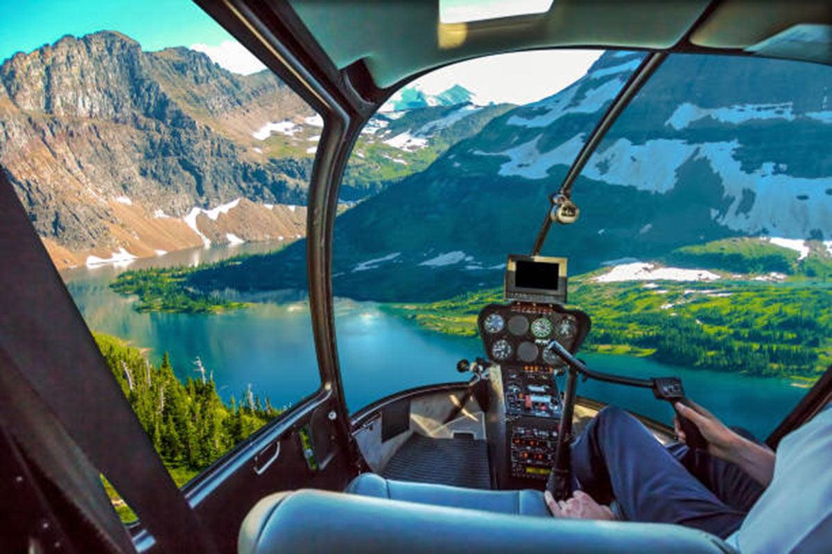 A view from the cockpit of a helicopter in Glacier National Park