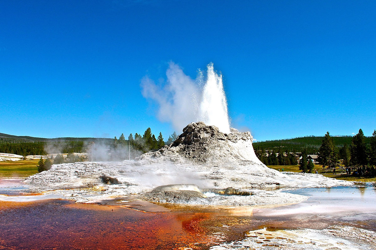 A geyser erupts near Old Faithful Lodge in Yellowstone National Park