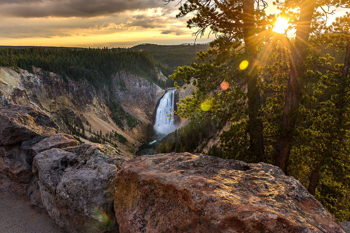 Overlook with a view of Yellowstone Falls at sunset in Yellowstone National Park