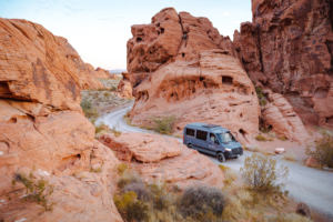 Moterra campervan driving a winding road in Southwest canyons
