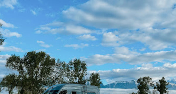 Side View of Moterra Luxury Sprinter Van Rental for Road Trip in Montana
