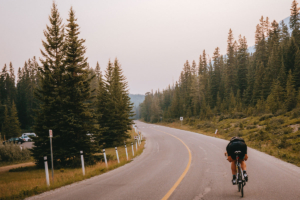 Cyclist on Road in Banff, Alberta, Canada