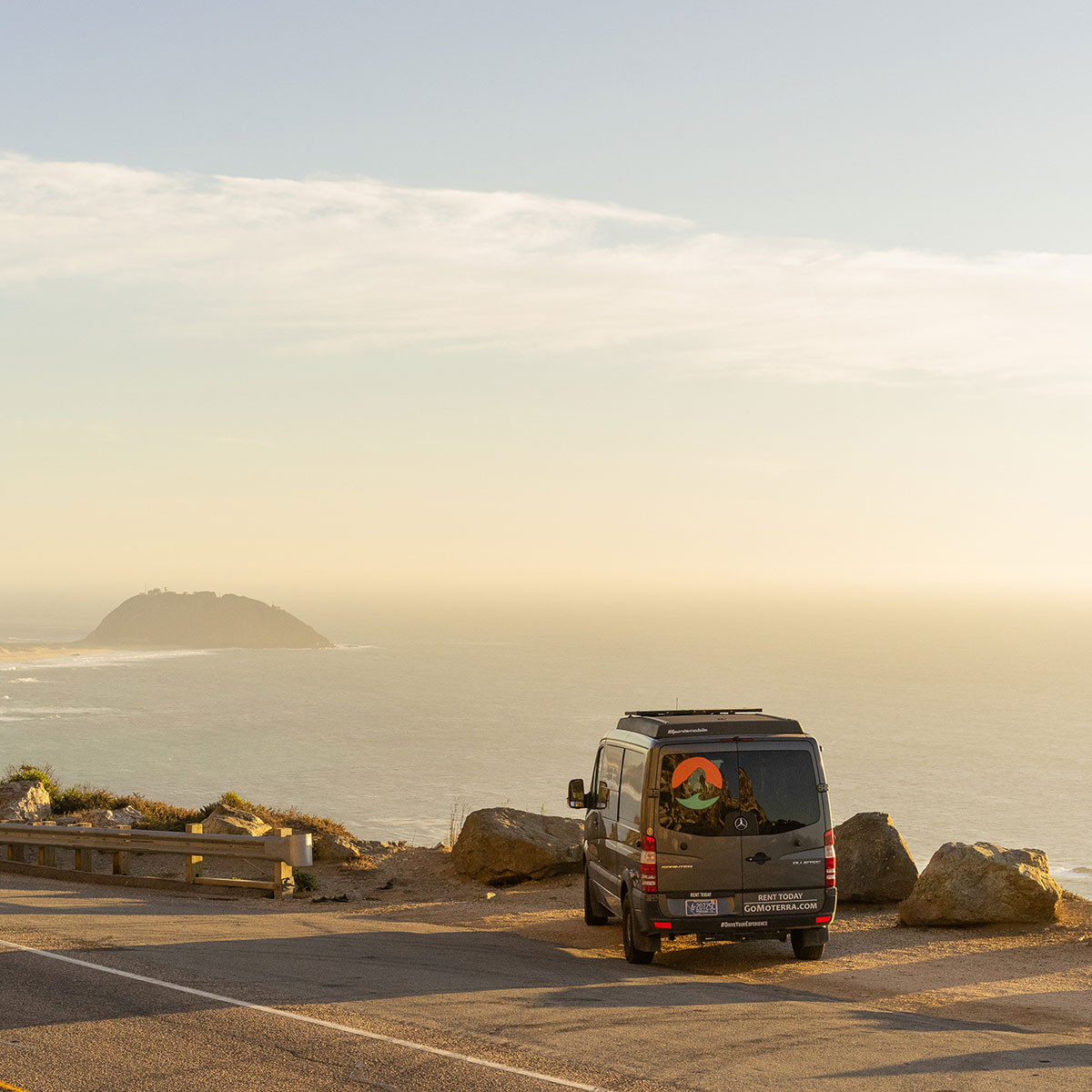 Moterra California Sprinter Campervan Rental Parked and Overlooking Pacific Ocean Near Sunset