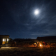 Moterra van camping under a full moon